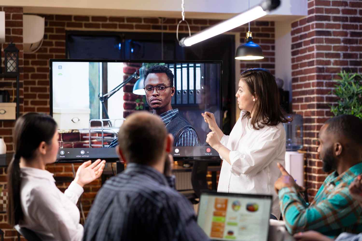 Professional Virtual Events Production Company managing a live corporate online event with multiple cameras and live streaming.